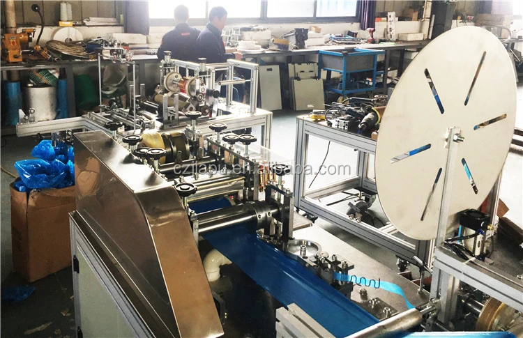 plastic shoe cover making machine