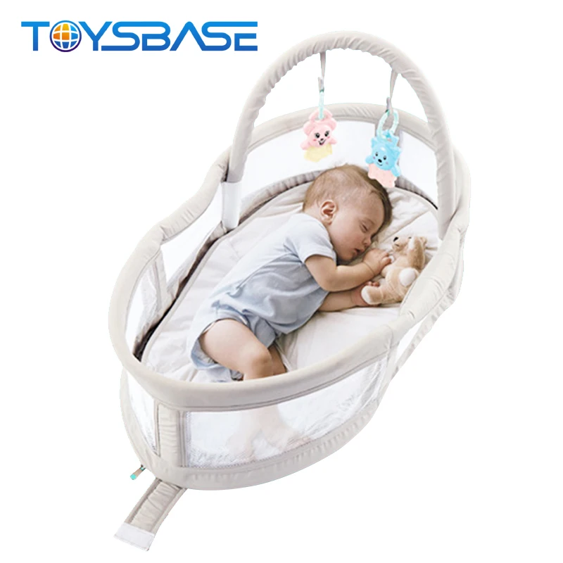 baby's bed in the shape of a basket