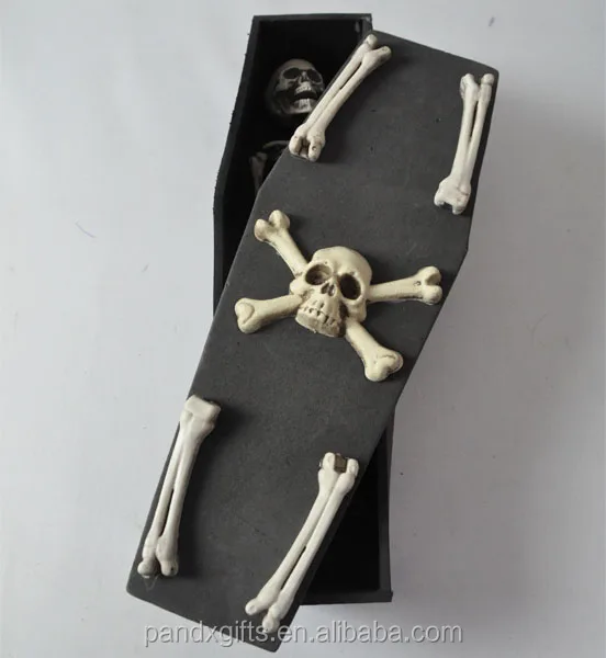 skull and bones glass coffin