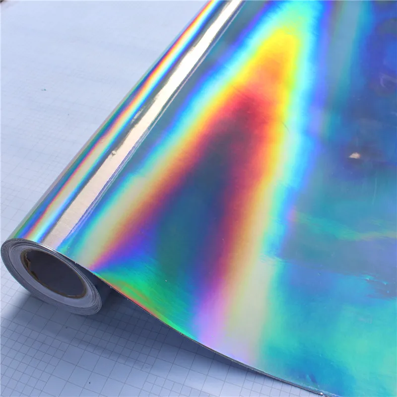 silver holographic laser chrome iridescent vinyl film car wrap on night