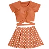 A refreshing little backless retro poly dot crossover top with a high waisted split swimsuit for summer 2019