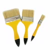 black bristle paint brush and rollers