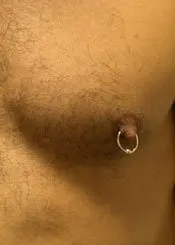 Nipple piercing - male. 
