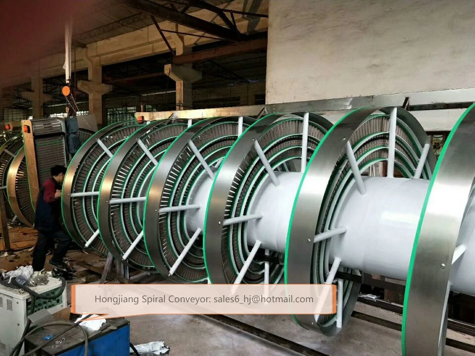 China Standard Chain Spiral Conveyor for lift up and down products between plant floors