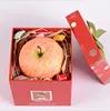 The factory provides cute apple boxes for friends on Christmas Eve