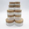 /product-detail/round-bamboo-lid-wide-mouth-glass-jar-cosmetic-jar-62123779264.html