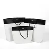 2019 Custom Printed White Flat Paper Handle Shopping Gift Kraft Paper Bags