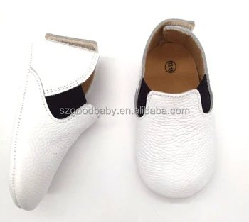 white leather baby shoes