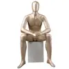 Golden fashion design boutique abstract egg head face full body sitting display male mannequin