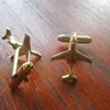 Novelty gold 3D zinc alloy airplane model unisex button cufflinks for sale