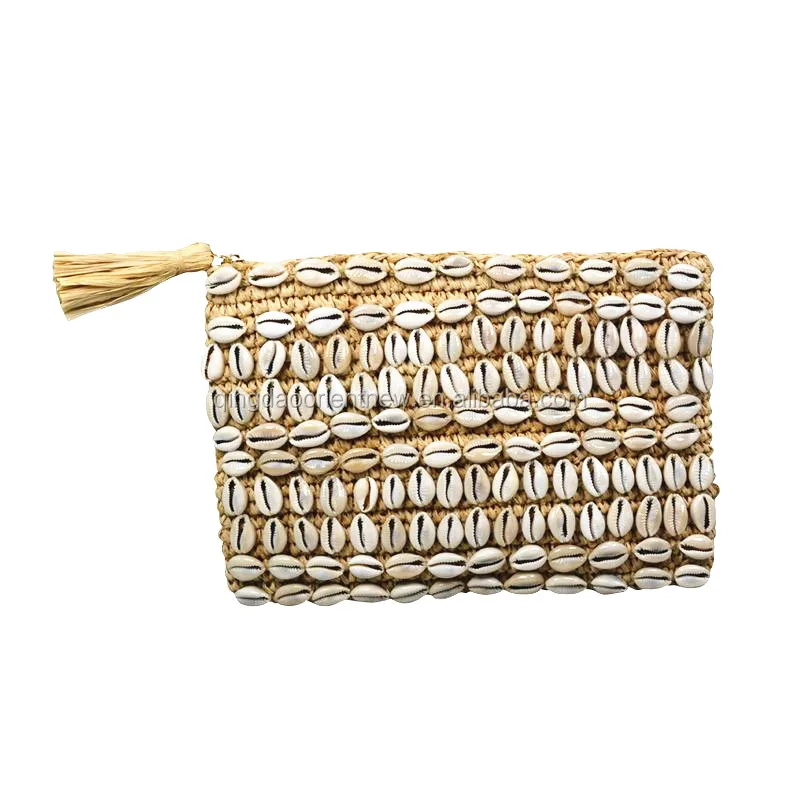 Clutch de fiesta de rafia de papel en natural con boquilla de pedrería azul  · LT · El Corte Inglés