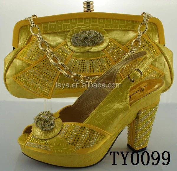 gold sandals and matching bag