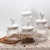 wholesale price different sizes glass candy jar with animal shape ceramic lid