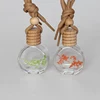 /product-detail/10ml-mini-round-car-air-freshener-glass-bottle-fragrance-essential-oil-hanging-glass-bottle-60780587555.html