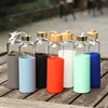/product-detail/550ml-high-quality-borosilicate-bamboo-lid-glass-water-bottle-with-silicone-sleeve-62061953407.html