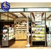 Top sale shopping mall cosmetic store shelf display design wooden wall mounted skin care products display cabinet