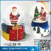 Christmas glass snow globe santa clause and snowman
