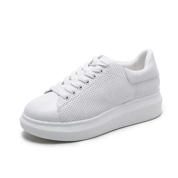 white flat tennis shoes