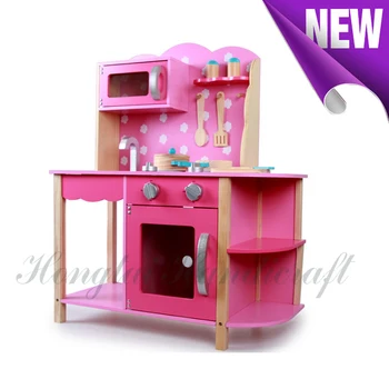 pink wooden kitchen set