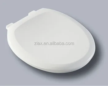 white plastic toilet seat