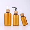 /product-detail/100ml-200ml-300ml-clear-amber-plastic-pet-travel-shampoo-lotion-bottle-with-bamboo-collar-62007789980.html
