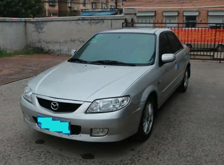 mazda 323 mud flaps