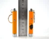 Factory supply Customized Logo and Multi-color Mini LED projector keychain