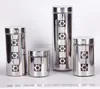 decorative metal casing wrapped glass canister