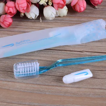 disposable travel toothbrush with toothpaste inside