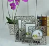 Wholesale metal mini photo frames antique silver plating flower hollow out style metal photo frame expert