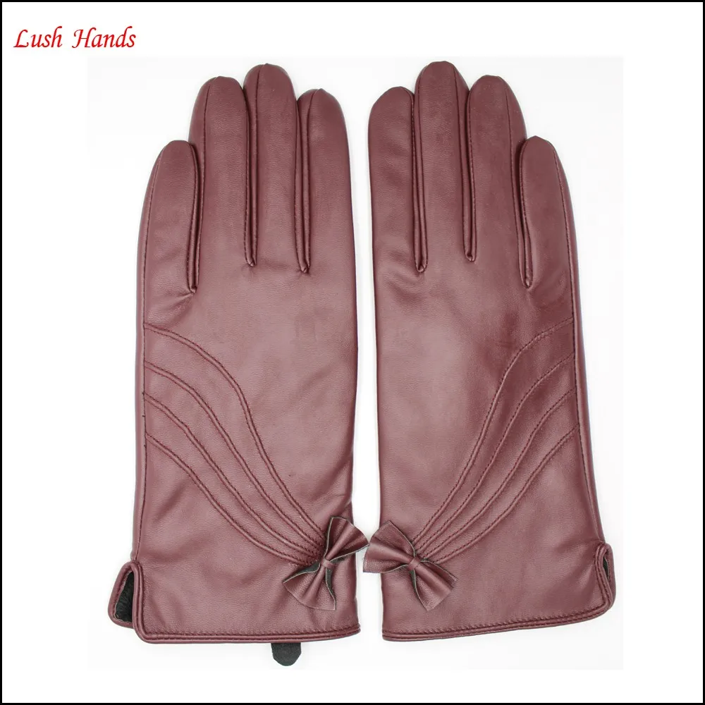 ladies and women's wine red leather gloves with Quilting and bow back