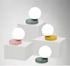 Modern simple milky gold egg shaped glass ball iron bedside reading hotel table lamps/light luxury