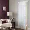 White carved wooden door design for bedroom