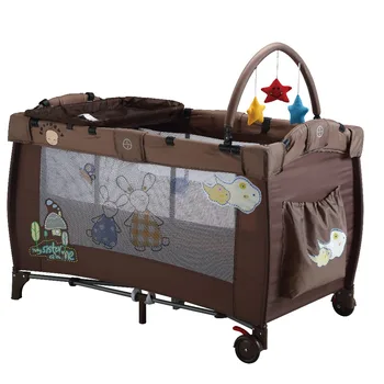 cot bed and changing table