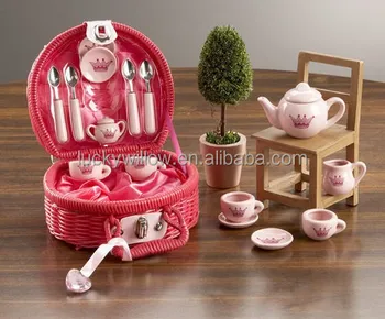 children's tea set in wicker basket