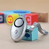 Promotional Gift Anti Wolf Alarm Egg Shaped personal security alarm device keychain manufacturer