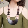 NLX-00083 wholesale black lip shell with large wood beads and cowrie shell necklace statement beach style