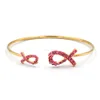 Gold red rhinestone bow twins bangle cuff