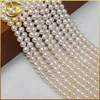 loose white round freshwater natural cheap cultivated pearl stands aaa