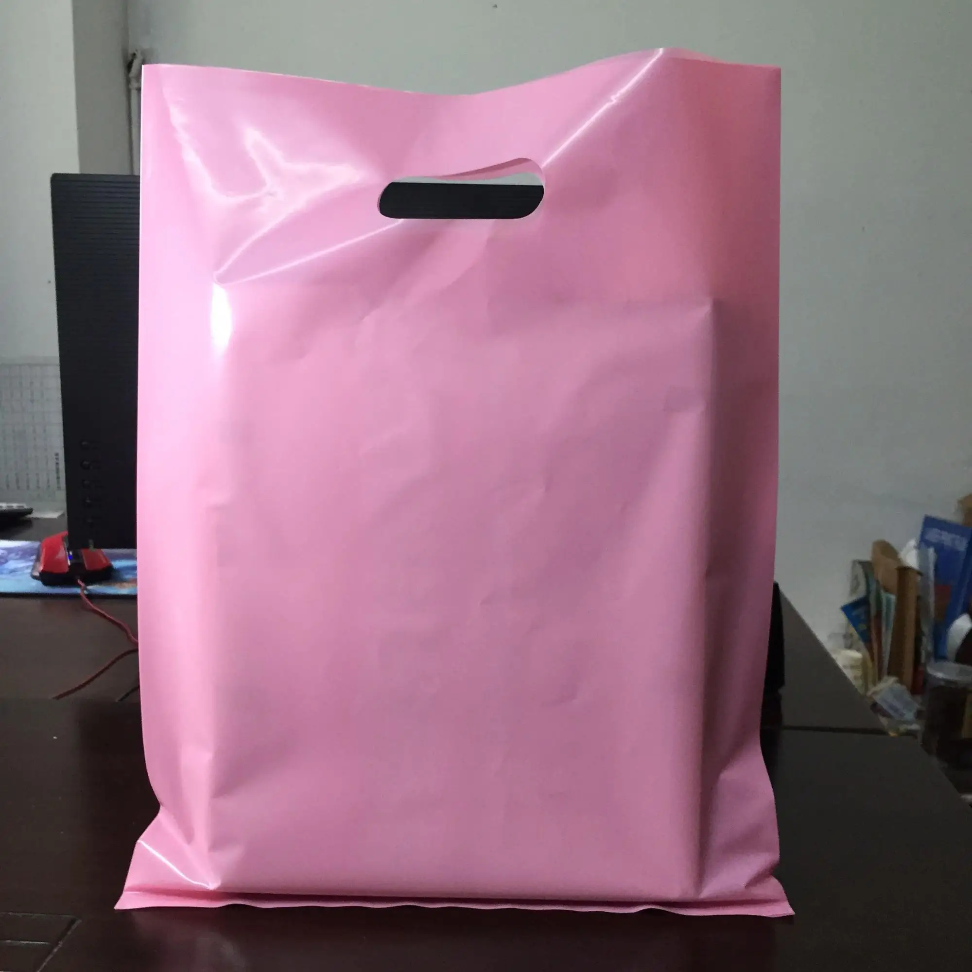 Oem Custom Logo Patch Handle Plastic Packaging Bag - Buy Plastic Bag ...
