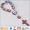 Catholic assorted saint pictures oval wood one decade rosary