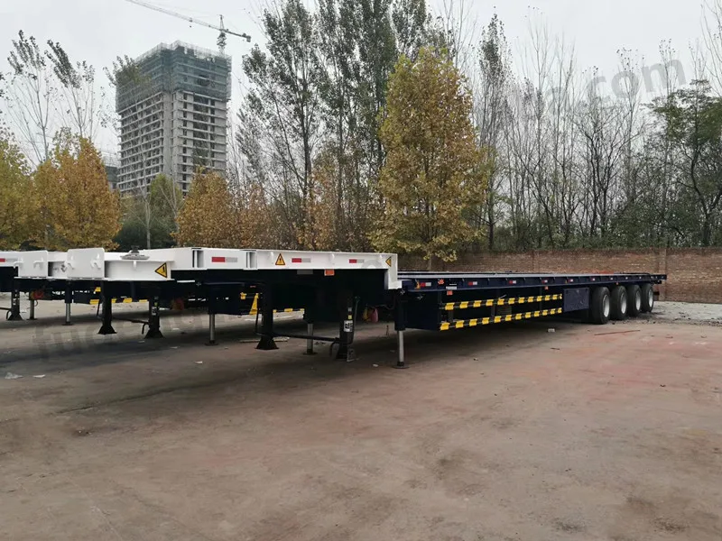 High Quality 4 Axles 100tons Heavy Capacity Lowbed Semi Trailer Wind