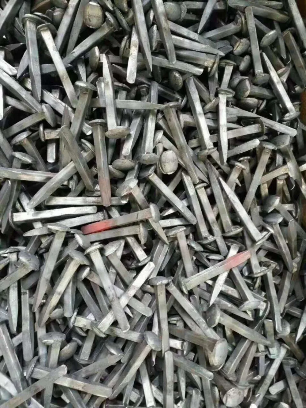 track spikes on concrete