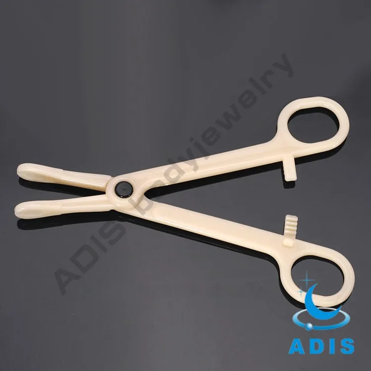 新到货优质米色亚克力塑料消毒一次性穿孔钳