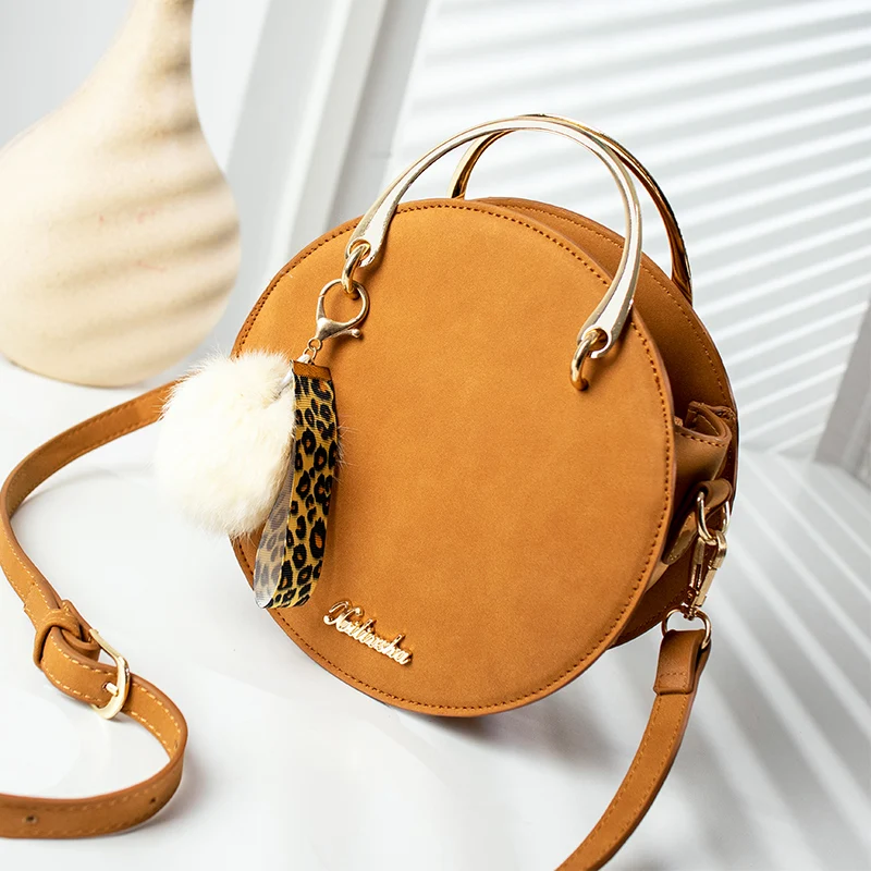 small round crossbody bag