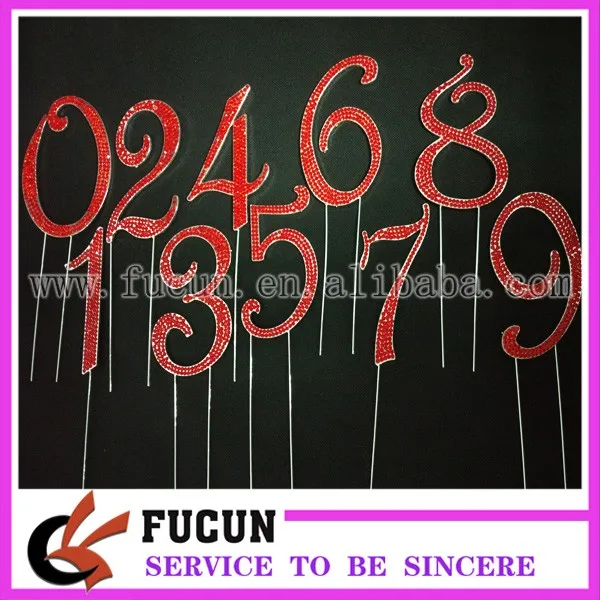 red rhinestone number 0-9 cake topper.jpg