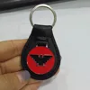 Customized leather keychain attached metal badge