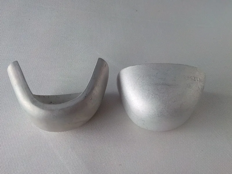 Aluminum toe cap for safety boots