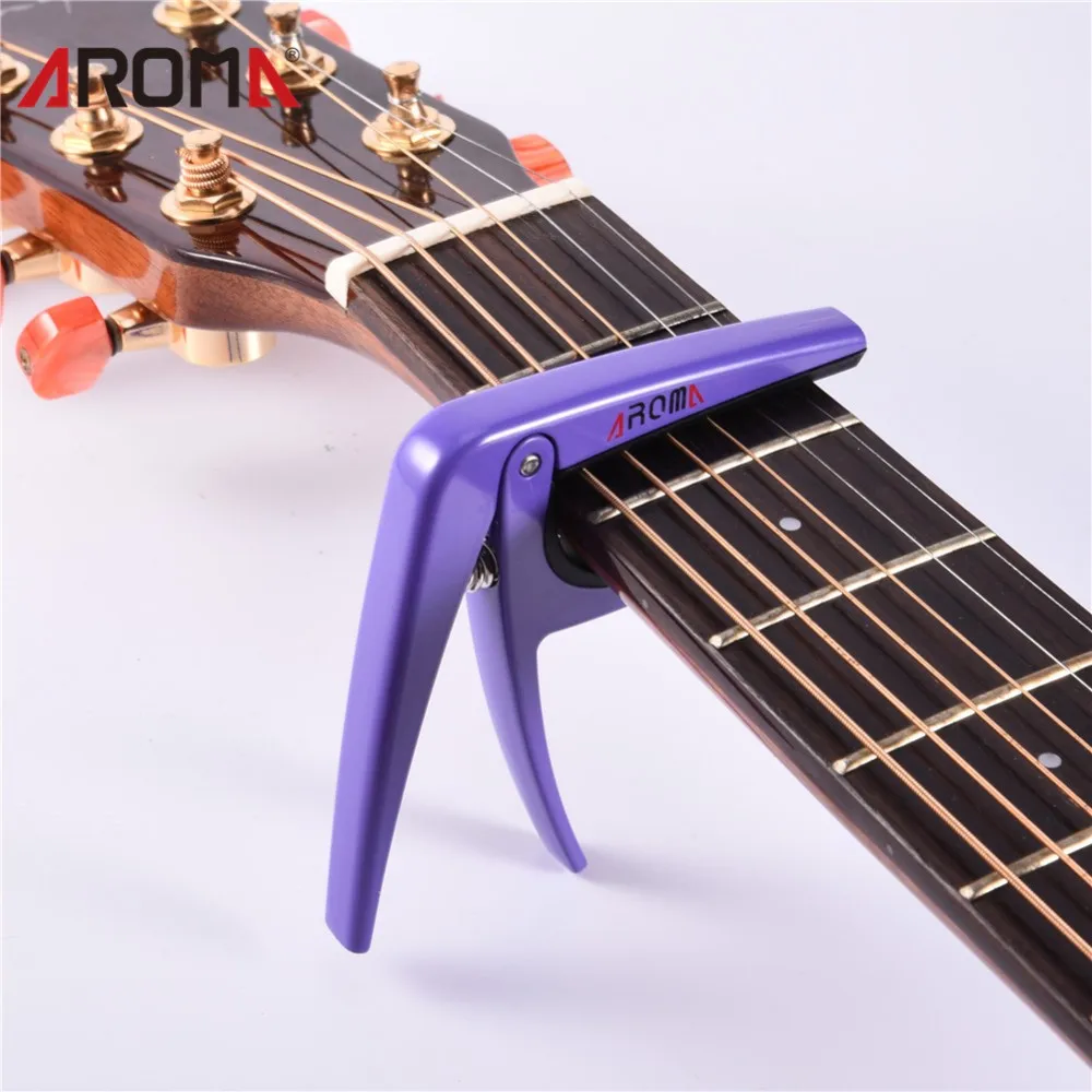 purple guitar capo