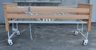 Adjustable electric treatment bed in hospital or home cart bed